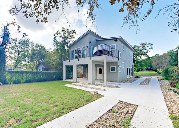 Kuhlman Unit A — completed home with second-floor balcony