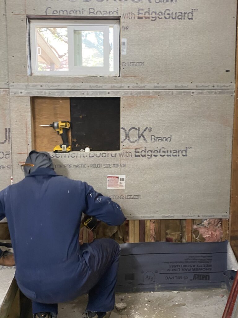 Oak Crest — waterproofing membrane applied to the shower walls and bench