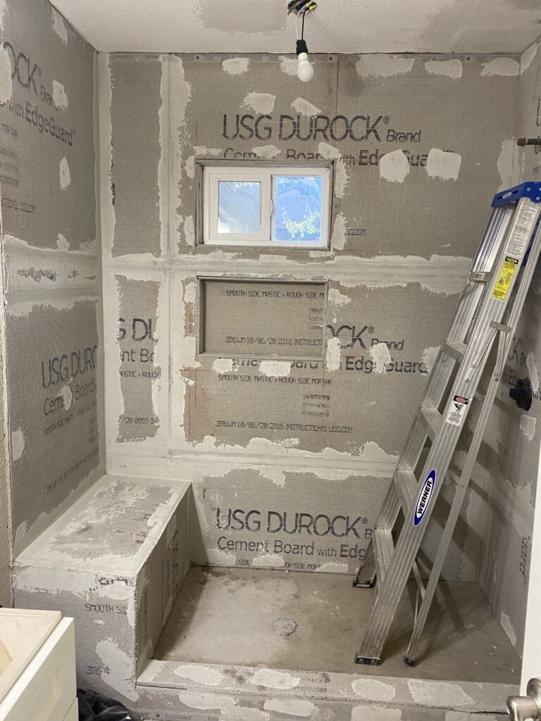 Oak Crest — waterproofed shower pan and curb